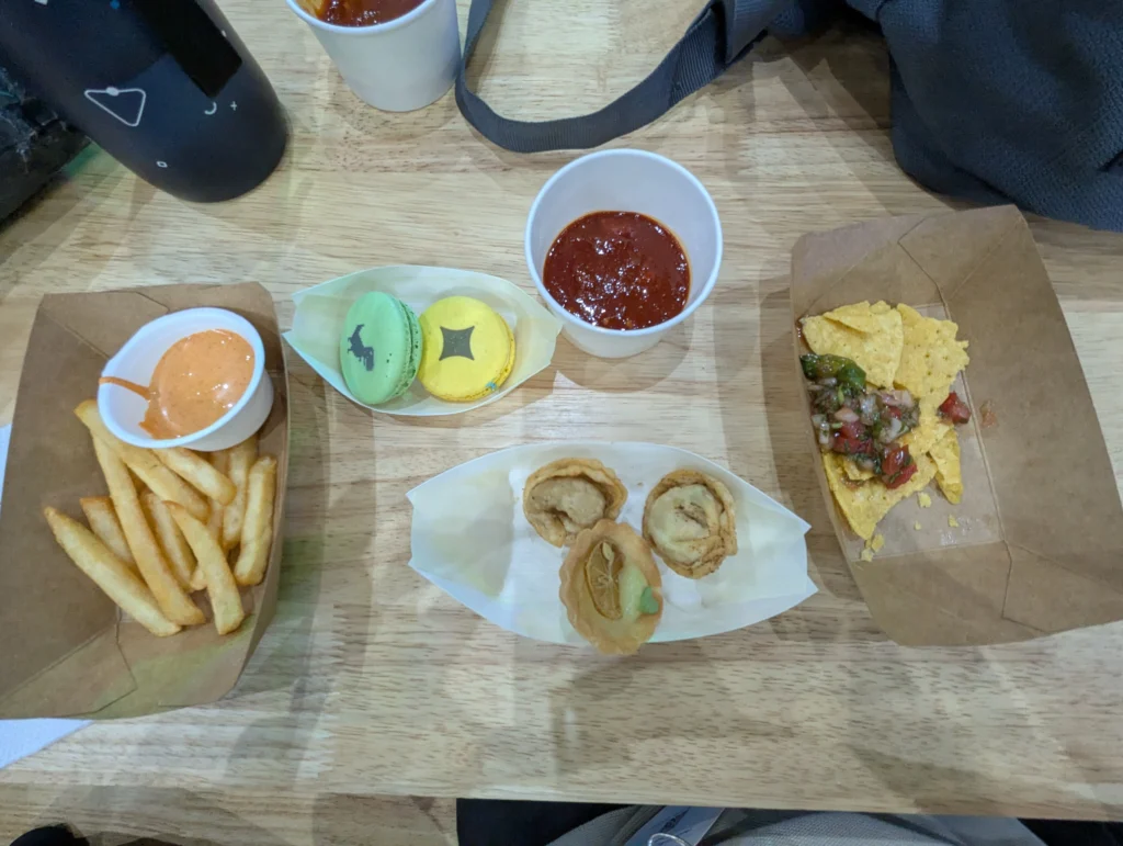 Snacks at Google IO Connect - French fries, macarons, dumplings, lemon tart and nachos
